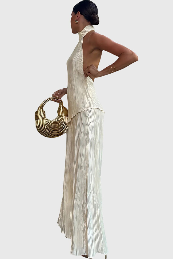 Conjunto elegante Pillarika con top asimétrico y pantalones fluidos