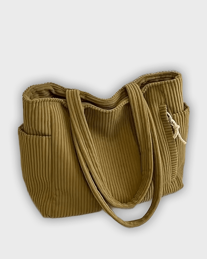 Bolso de mano con detalles en hilo