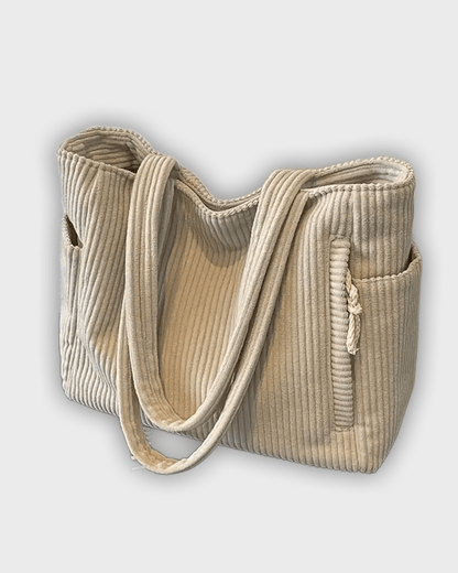 Bolso de mano con detalles en hilo