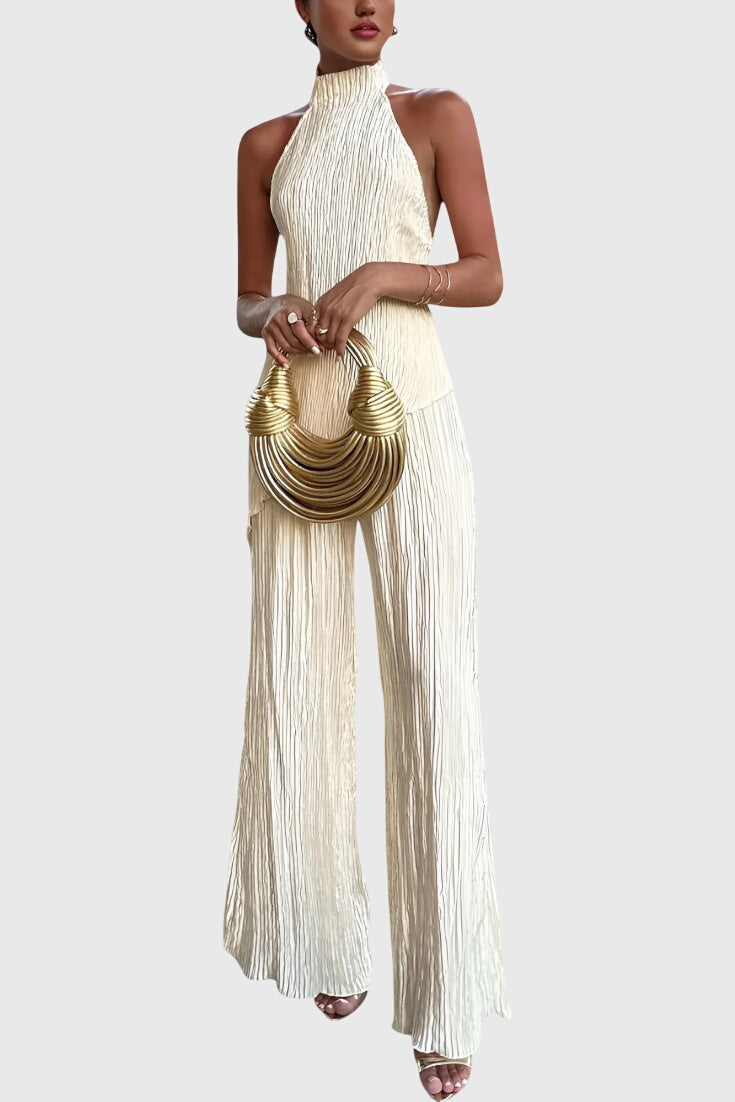 Conjunto elegante Pillarika con top asimétrico y pantalones fluidos