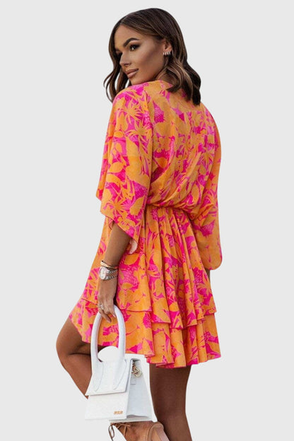 Vestido Eliza mini con nudo frontal y detalles