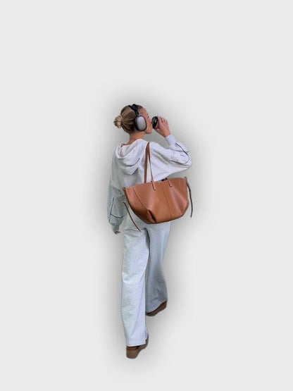 Bolso de mano con pliegues laterales