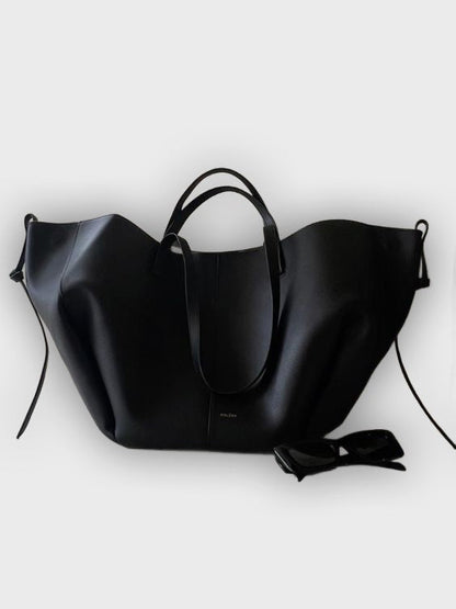 Bolso de mano con pliegues laterales