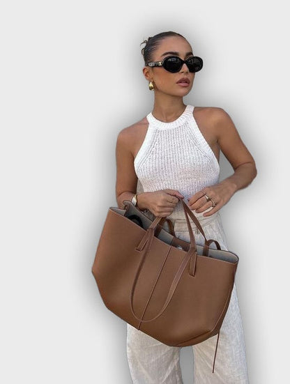 Bolso de mano con pliegues laterales