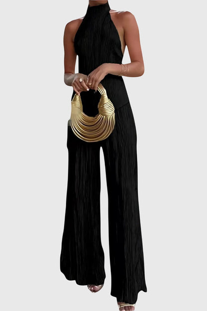 Conjunto elegante Pillarika con top asimétrico y pantalones fluidos