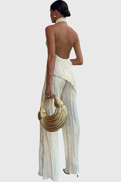 Conjunto elegante Pillarika con top asimétrico y pantalones fluidos