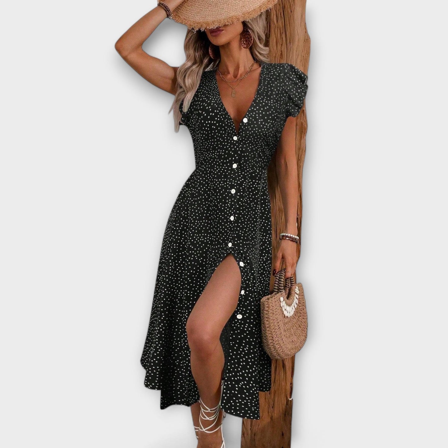 Vestido midi elegante con lunares