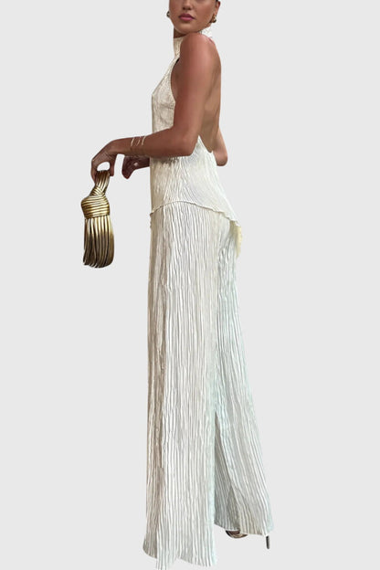 Conjunto elegante Pillarika con top asimétrico y pantalones fluidos