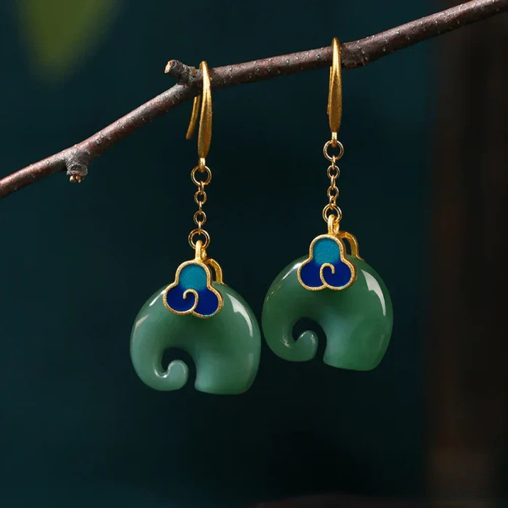 Pendientes de elefante retro verdes de lujo